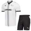 Virallinen pelipaita Derby County Koti 2026-27 Lyhythihainen - Lasten ( + Lyhyet housut ) Virallinen pelipaita Derby County Koti 2026-27 Lyhythihainen - Lasten ( + Lyhyet housut )