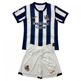 Virallinen pelipaita Real Sociedad Koti 2026-27 Lyhythihainen - Lasten ( + Lyhyet housut )